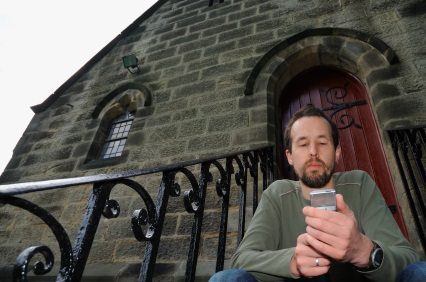 texting in front of church