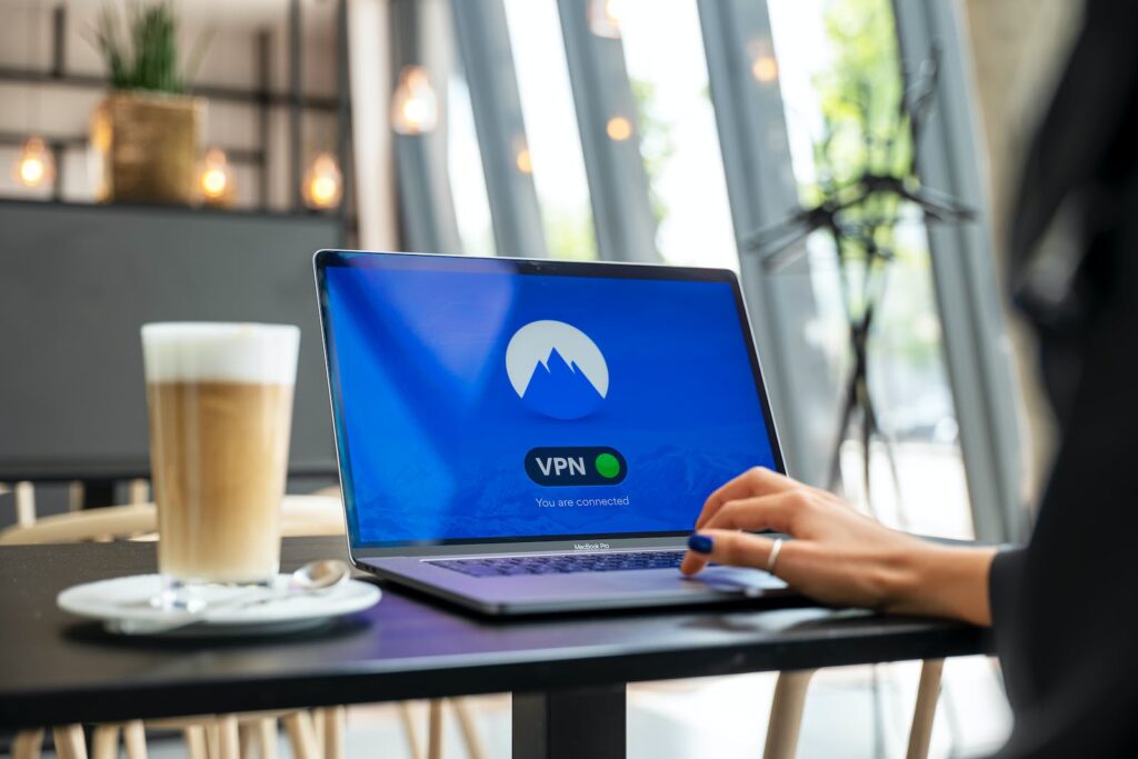 Person Using VPN on Laptop Computer