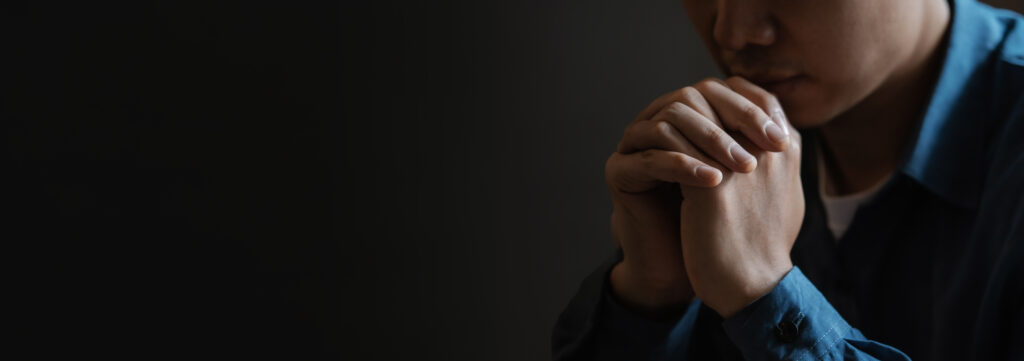 a young man sits and prays to god with faith and 2023 12 08 04 50 57 utc