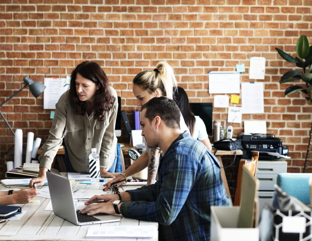 a group of creatives having a meeting 2023 11 27 05 21 51 utc