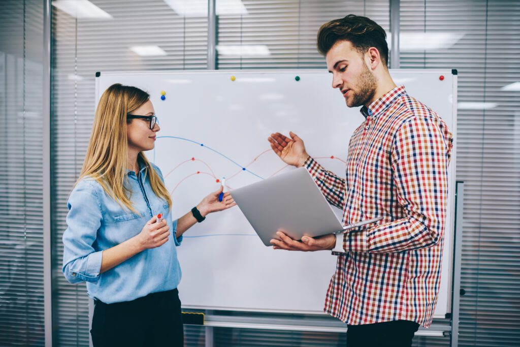 colleagues discussing business plan in office 2023 11 27 04 52 31 utc