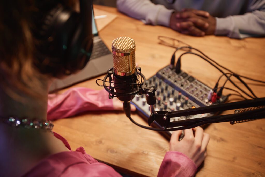 female podcast host with microphone and sound mixe 2024 01 31 19 17 21 utc