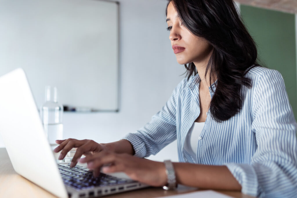 elegant young business woman working with her lapt 2024 02 23 05 03 29 utc