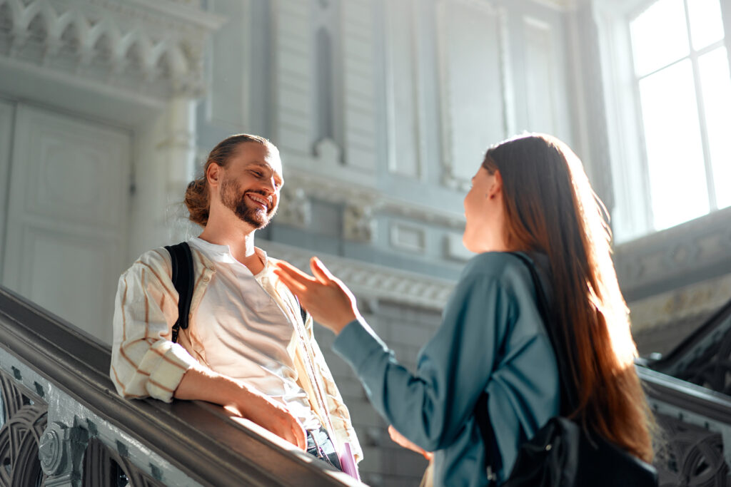 students chatting on a university stairway soakin 2024 06 11 19 47 11 utc
