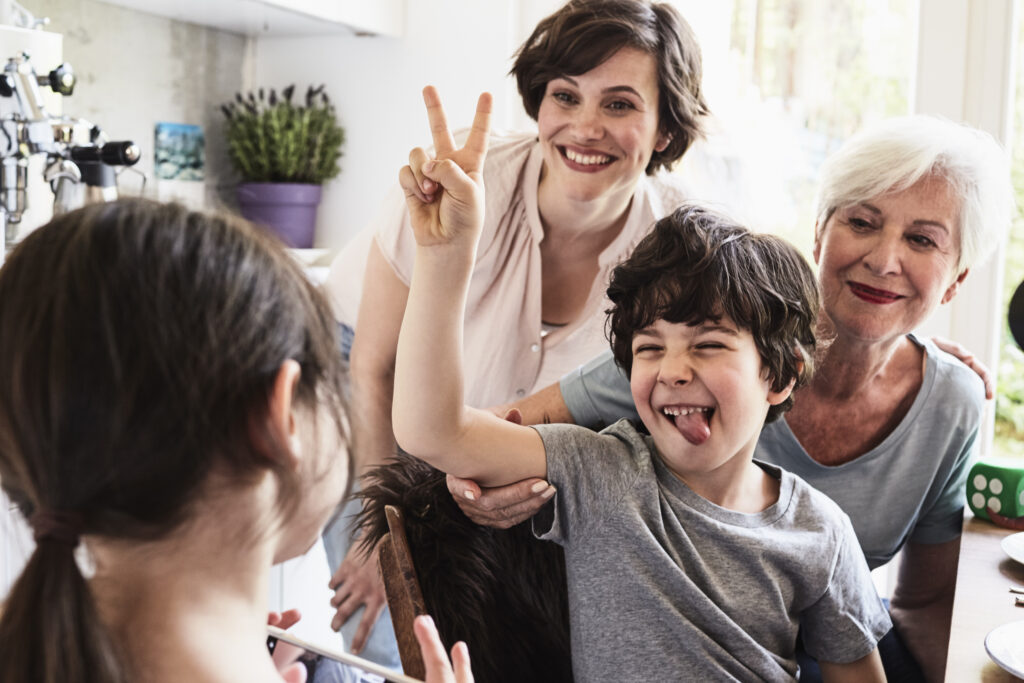 young girl photographing brother mother and gran 2024 06 27 21 54 31 utc