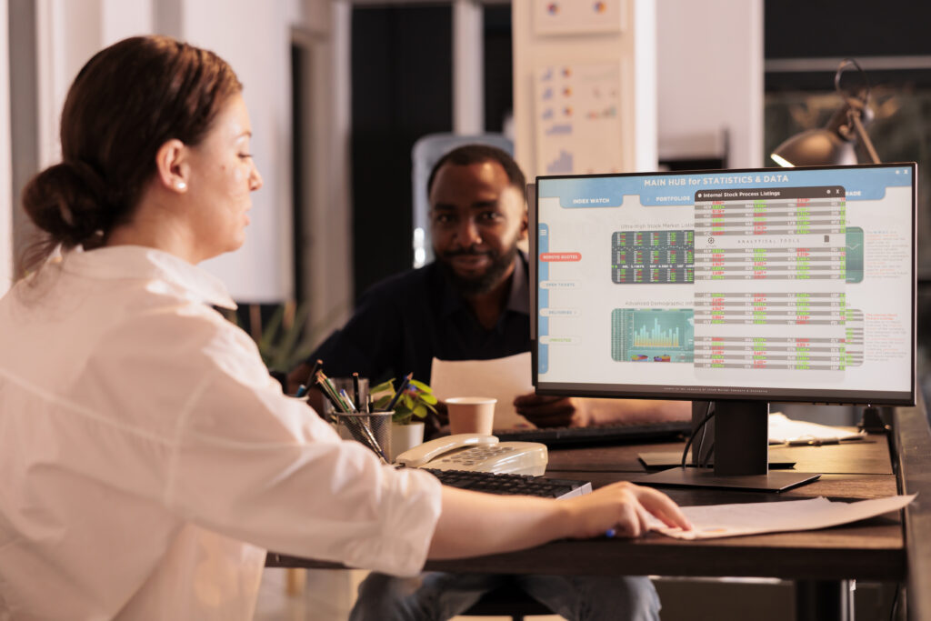 corporate worker analyzing fund market statistics 2023 11 27 05 24 19 utc