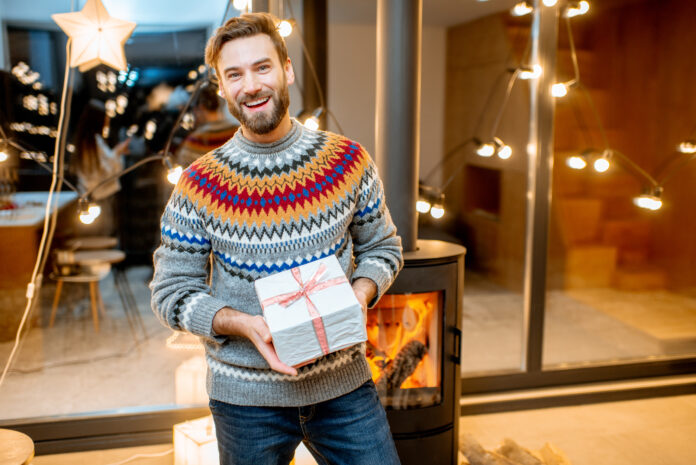 A virtual twin of a man holding a gift box for ministry branding.