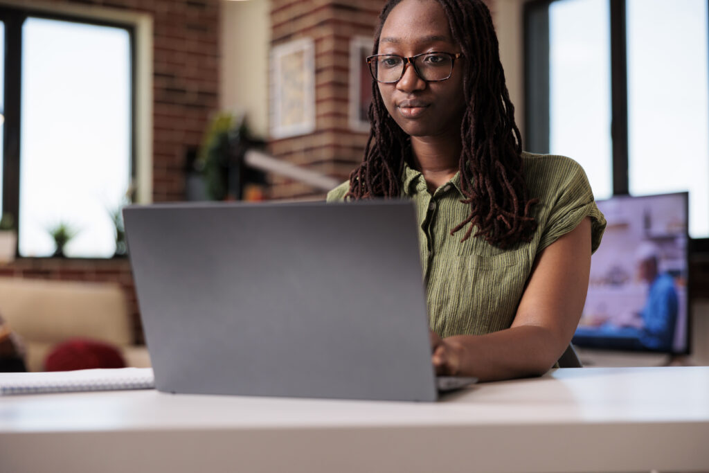 portrait of confident freelancer looking at laptop 2025 02 19 21 49 37 utc